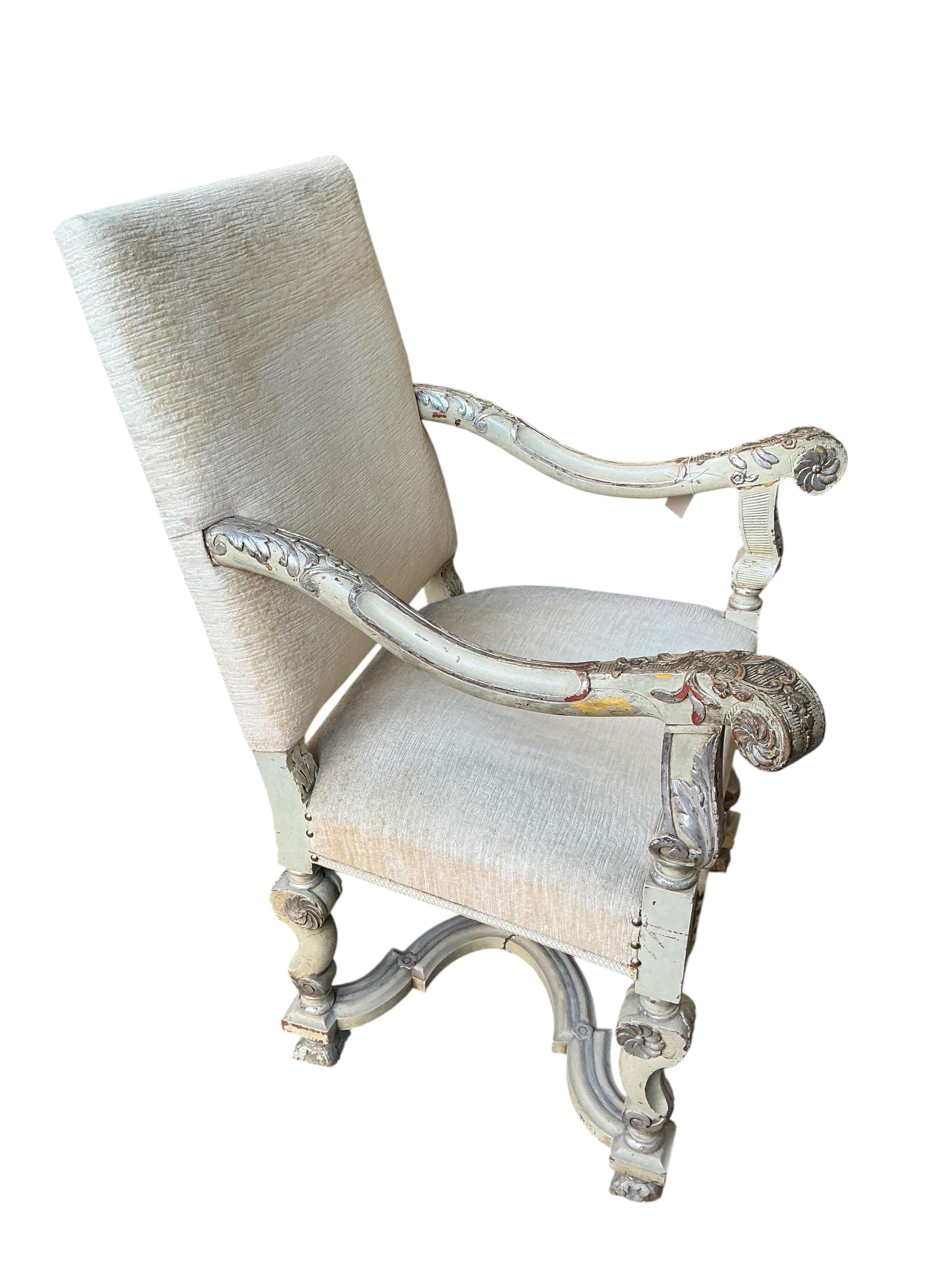 A Louis XVI style painted open armchair, width 70cm, depth 60cm, height 104cm